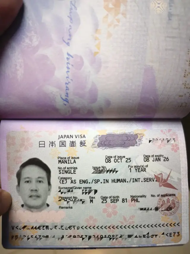 Passport opened to a Japan visa sticker