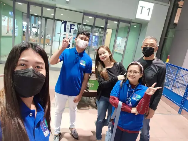 Selfie of staff and participants at the Terminal 1 entrance