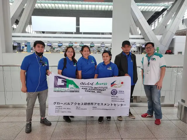 Staff and participants holding the GLOBAL ACCESS banner in the airport check-in hall