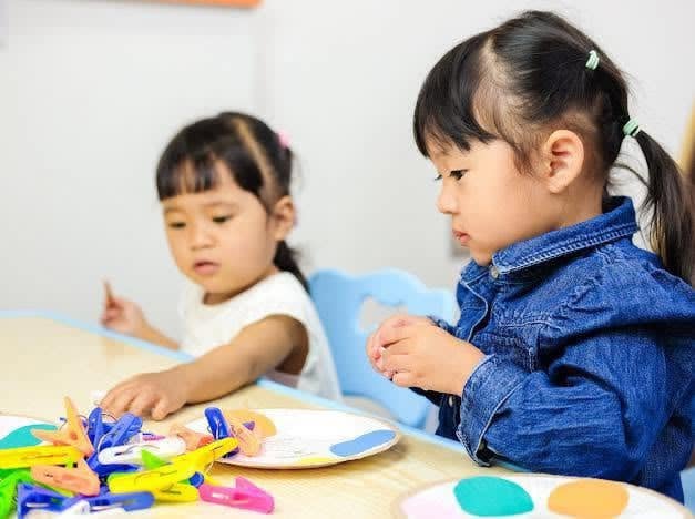 Diverse smiling children learning